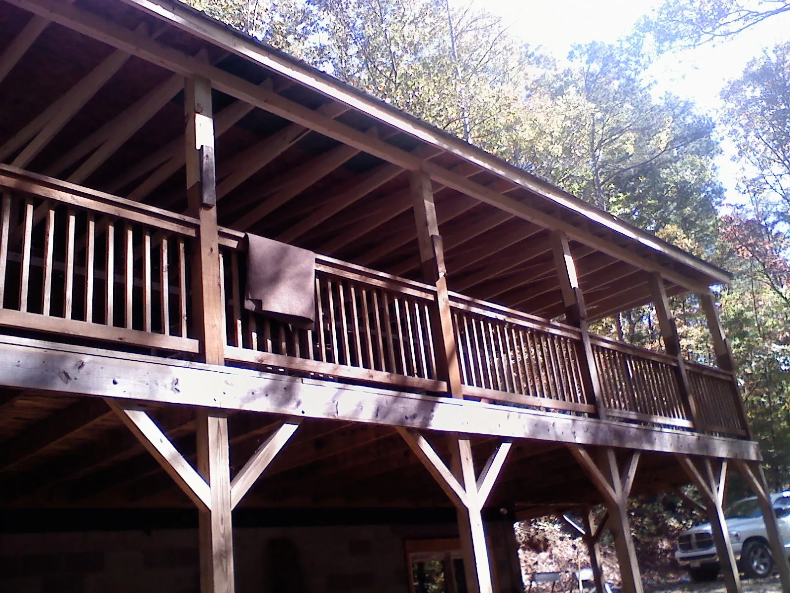 Timber framing under a new elevated porch and deck — Roof Leak Repair in Adamsville by Roofing Brothers